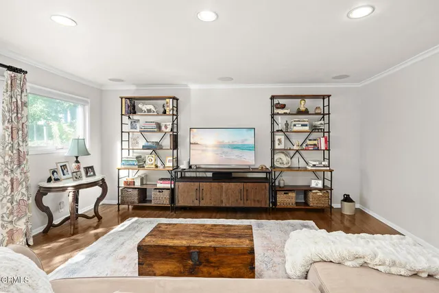 a bathroom with a toilet a sink and a mirror