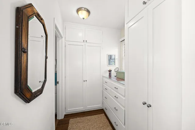 a view of balcony with outdoor seating and city view