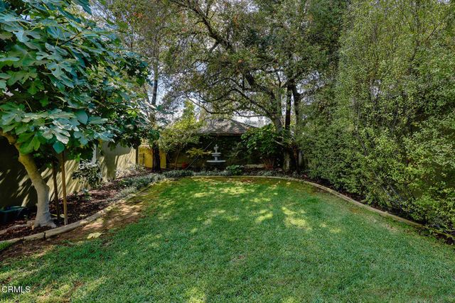 a front view of a building with many windows