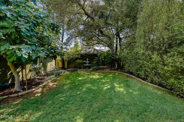 a front view of a building with many windows