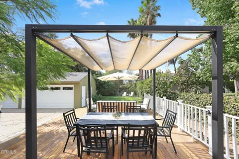 a view of a building with a tub and a potted plant