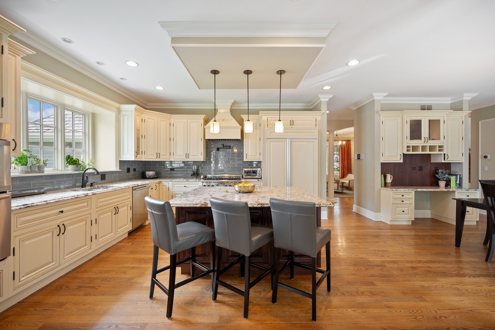2548 Glenview Road Glenview, IL 60025 - Photo 13 of 39 a large kitchen with a table and chairs