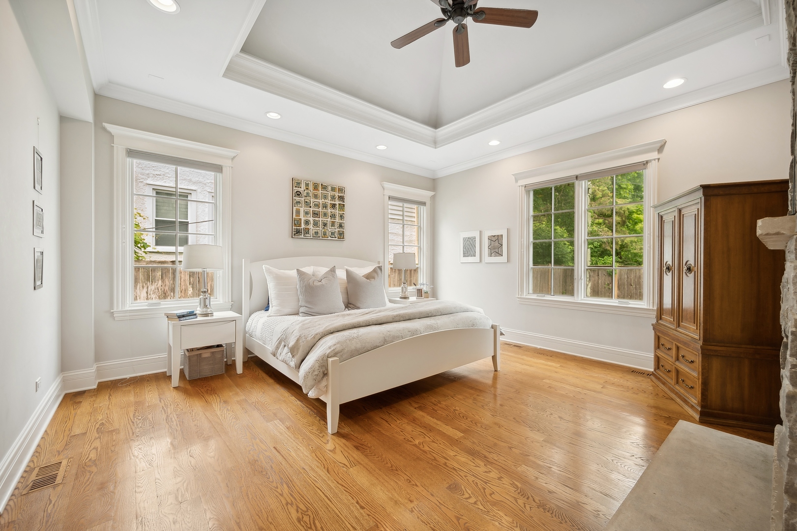 2548 Glenview Road Glenview, IL 60025 - Photo 19 of 39 a spacious bedroom with a balcony a bed and a couch