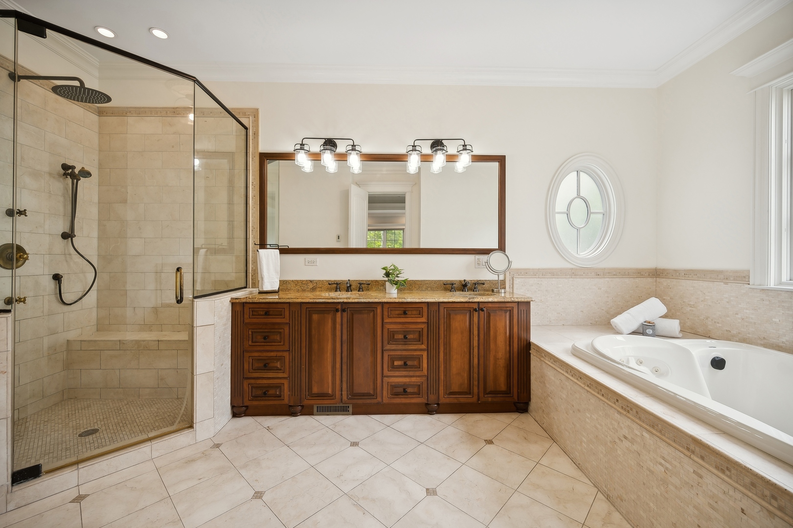 2548 Glenview Road Glenview, IL 60025 - Photo 21 of 39 a spacious bathroom with a tub sink and mirror