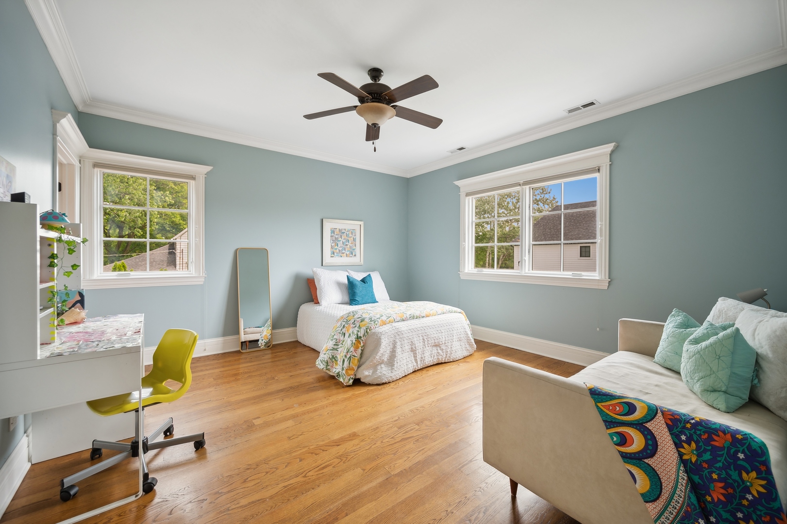 2548 Glenview Road Glenview, IL 60025 - Photo 23 of 39 a bedroom with a bed and wooden floor