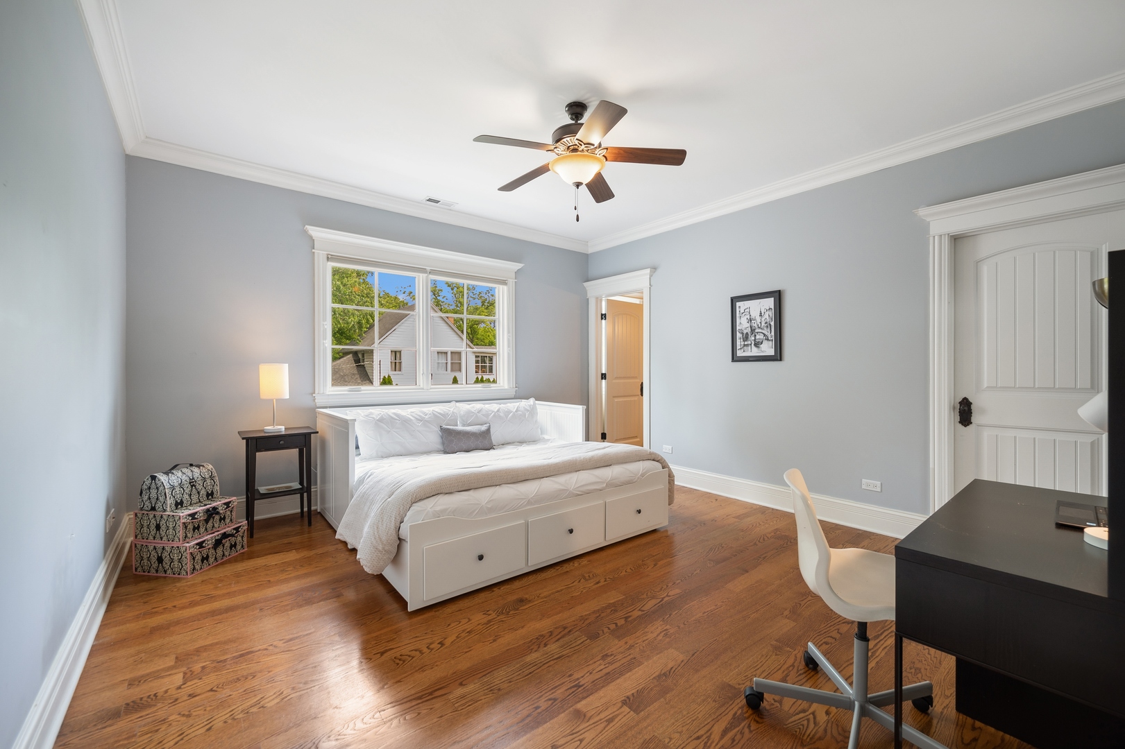 2548 Glenview Road Glenview, IL 60025 - Photo 24 of 39 a bedroom with a bed and a desk