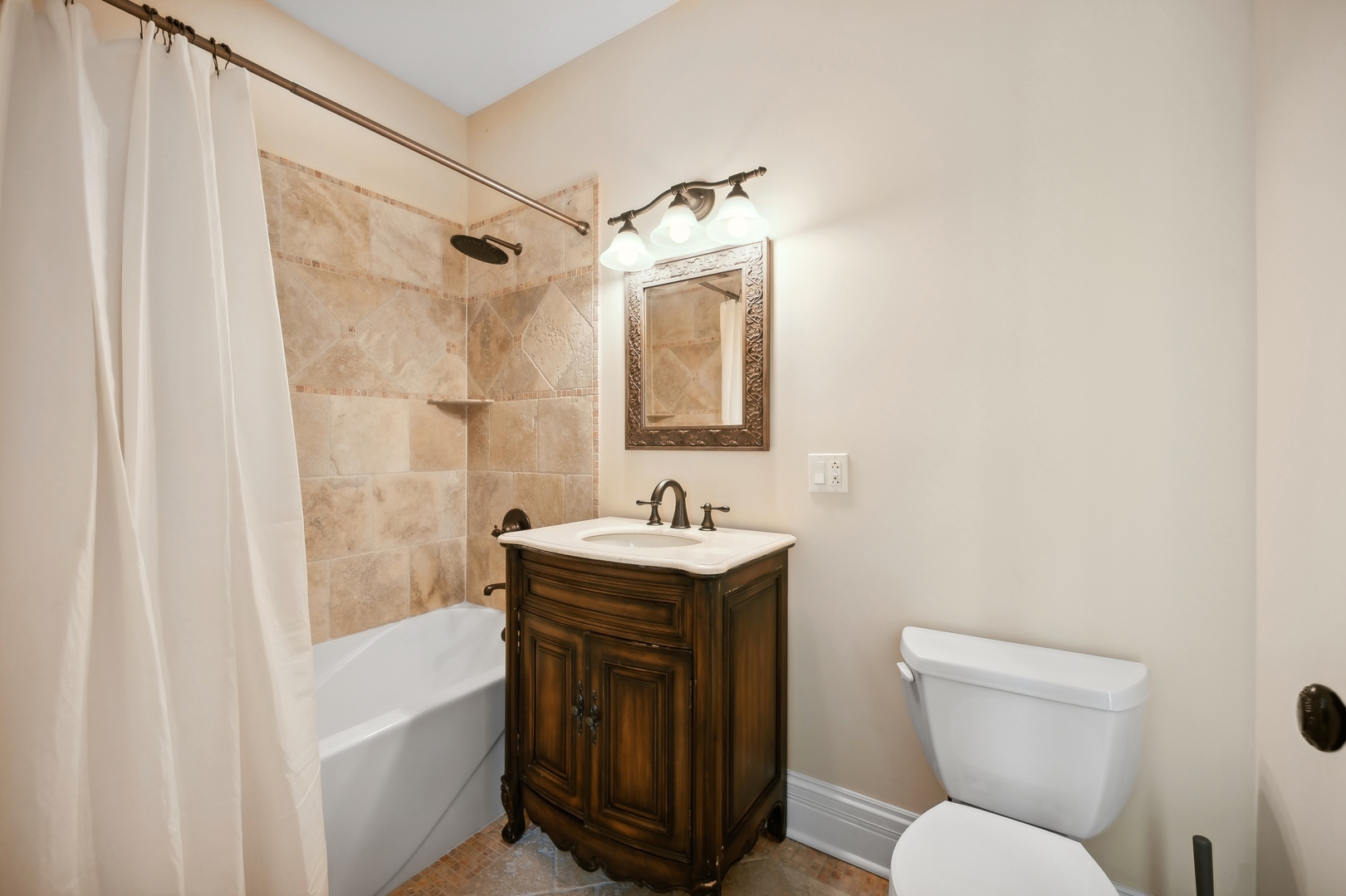 2548 Glenview Road Glenview, IL 60025 - Photo 27 of 39 a bathroom with a sink a toilet and shower