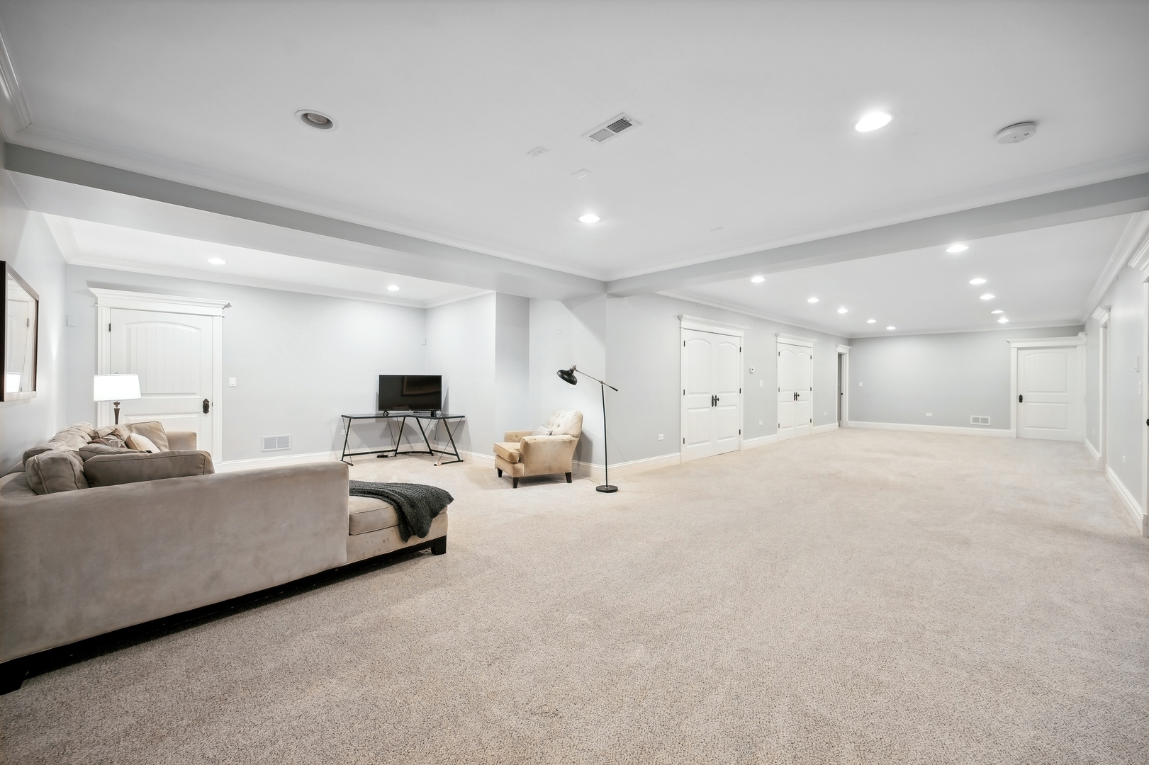 2548 Glenview Road Glenview, IL 60025 - Photo 28 of 39 a living room with furniture and a large window