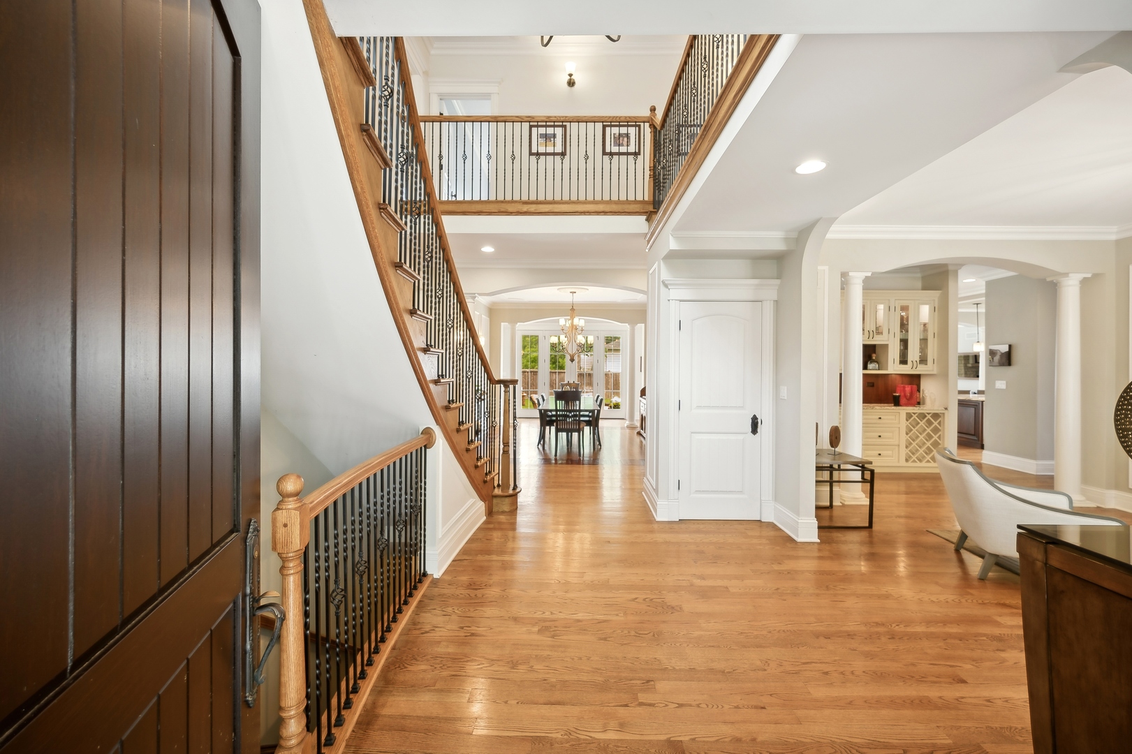 2548 Glenview Road Glenview, IL 60025 - Photo 3 of 39 a view of entryway and hall with wooden floor
