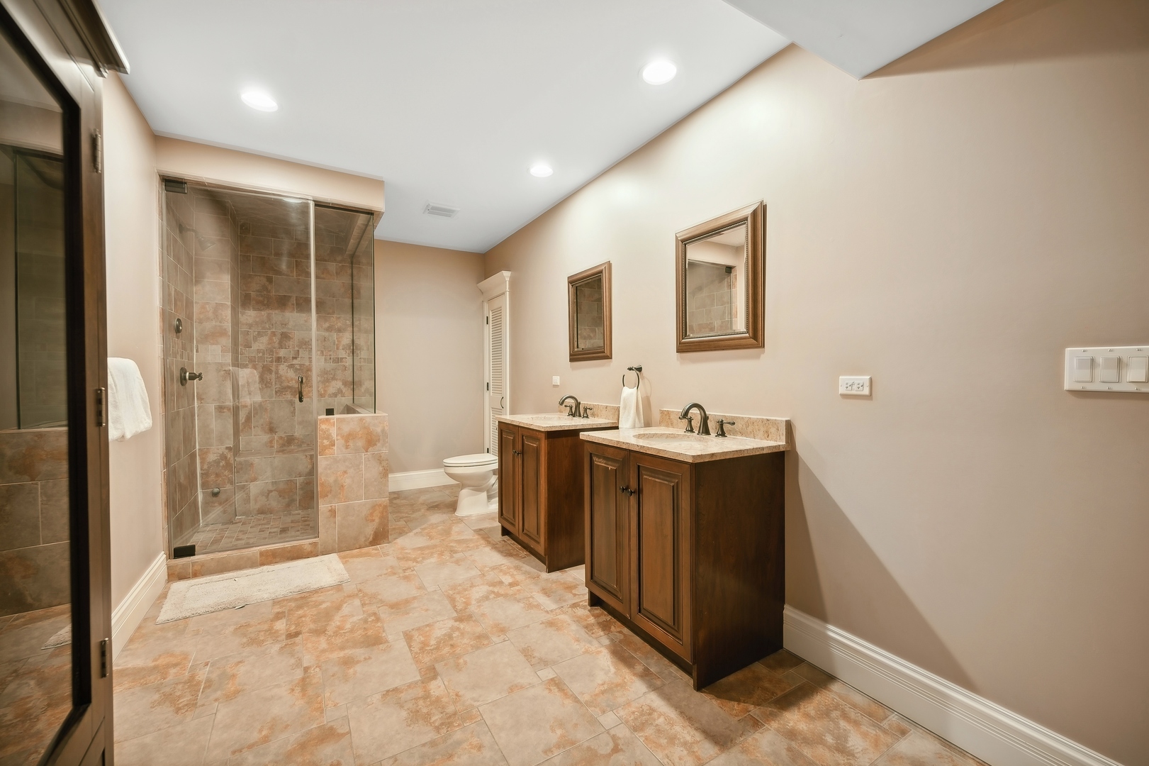 2548 Glenview Road Glenview, IL 60025 - Photo 32 of 39 a spacious bathroom with a tub sink and mirror