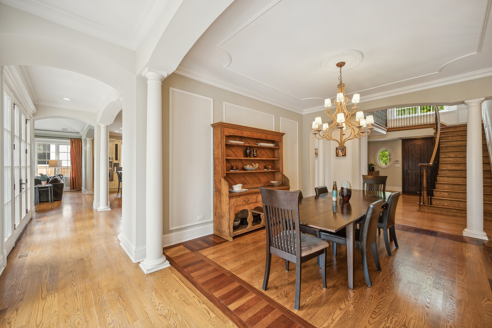 2548 Glenview Road Glenview, IL 60025 - Photo 9 of 39 a view of a dining room with furniture and wooden floor