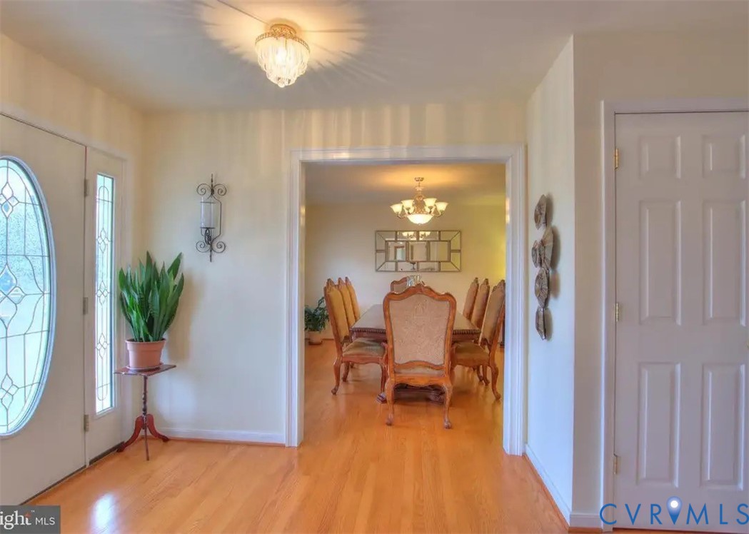 15390 Moores Mill Road Ruther Glen, VA 22546 - Photo 13 of 19 a view of a livingroom with furniture and a potted plant
