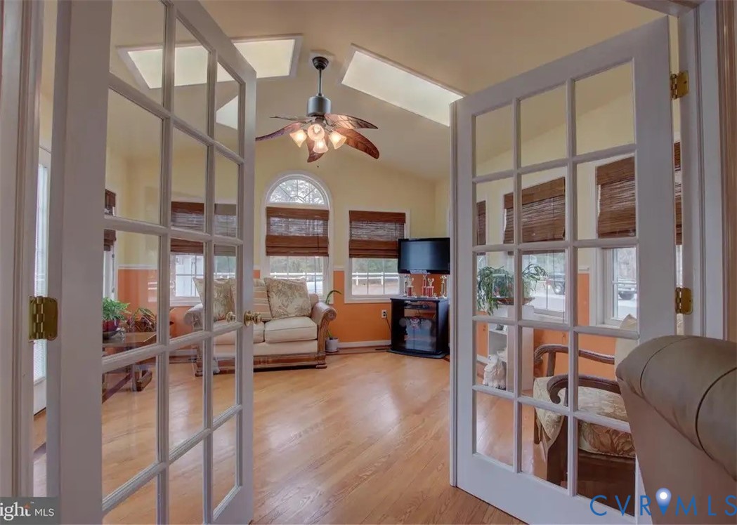 15390 Moores Mill Road Ruther Glen, VA 22546 - Photo 17 of 19 a view of living room filled with furniture and a large window