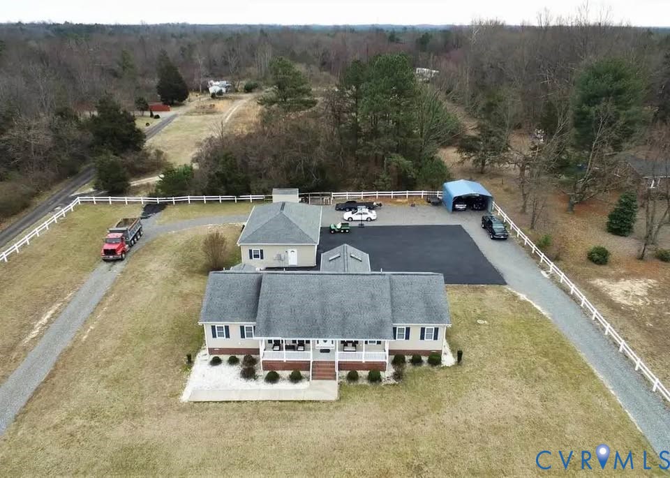 15390 Moores Mill Road Ruther Glen, VA 22546 - Photo 2 of 19 a view of a swimming pool with a yard