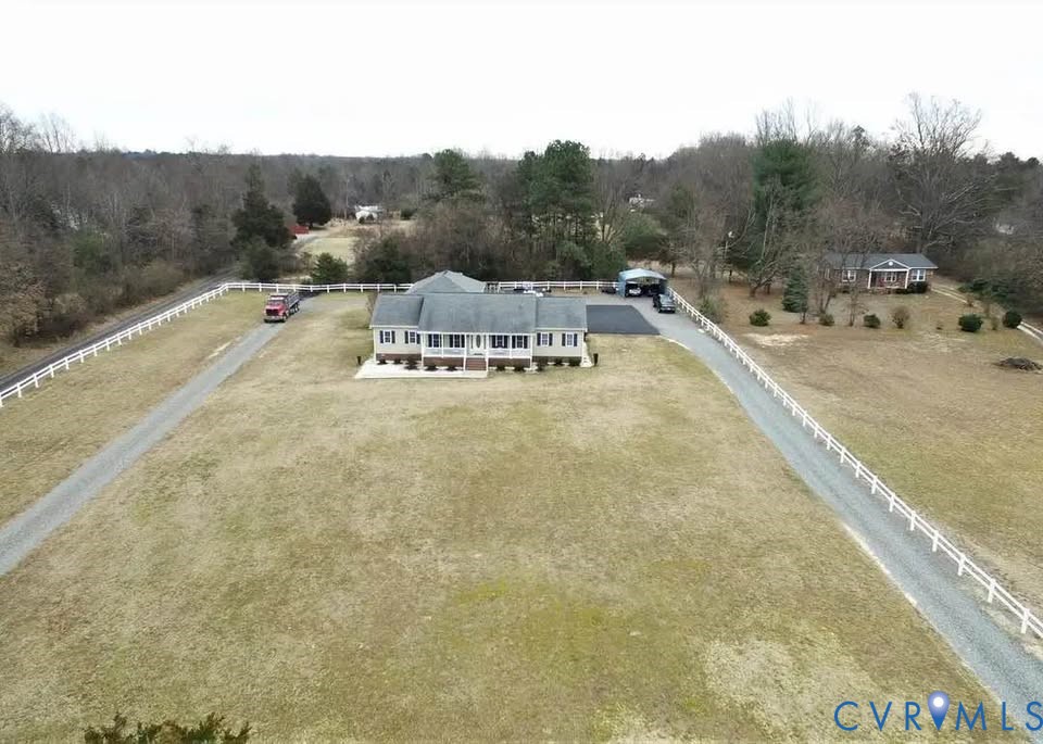 15390 Moores Mill Road Ruther Glen, VA 22546 - Photo 3 of 19 a view of a swimming pool with a yard and mountain view