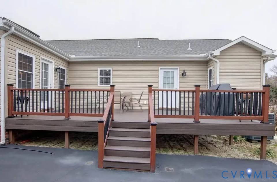 15390 Moores Mill Road Ruther Glen, VA 22546 - Photo 9 of 19 a view of a house with wooden deck