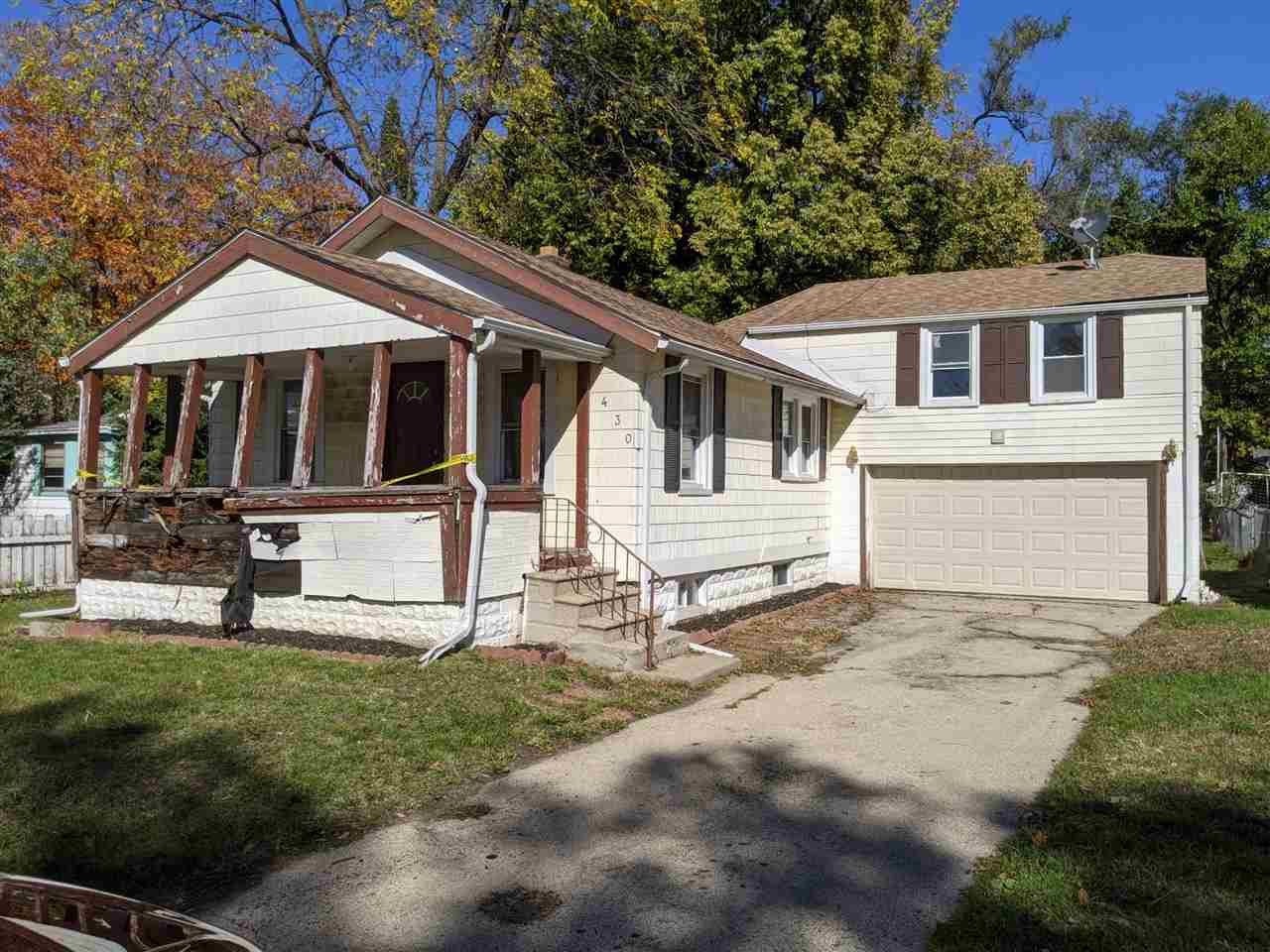 430 Barry Road Rockford, IL 61109 - Photo 1 of 13 a front view of a house with a yard