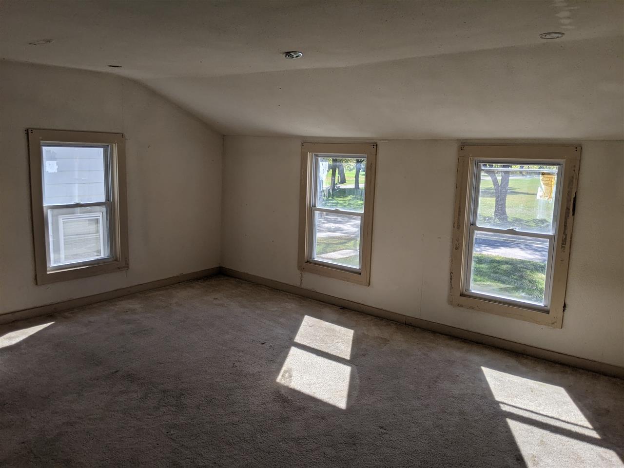 430 Barry Road Rockford, IL 61109 - Photo 13 of 13 an empty room with windows
