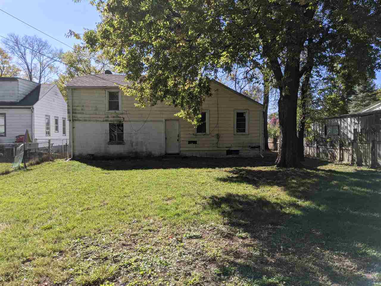 430 Barry Road Rockford, IL 61109 - Photo 3 of 13 a house view with a garden space