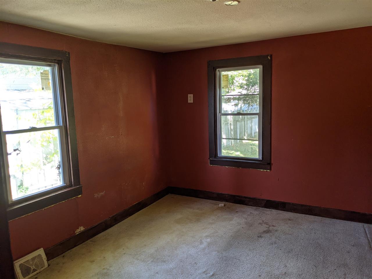 430 Barry Road Rockford, IL 61109 - Photo 9 of 13 an empty room with windows