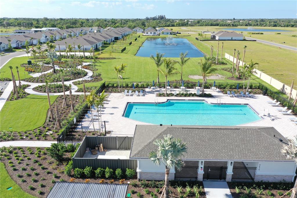 9450 Turtle Grass Circle Punta Gorda, FL 33950 - Photo 24 of 35 an aerial view of a house with a lake view