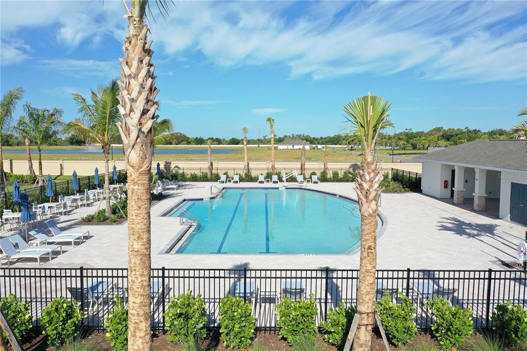 9450 Turtle Grass Circle Punta Gorda, FL 33950 - Photo 27 of 35 a view of a balcony and floor to ceiling windows