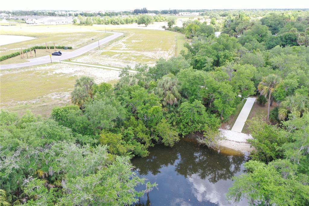 9450 Turtle Grass Circle Punta Gorda, FL 33950 - Photo 33 of 35 a view of an outdoor space and a lake view