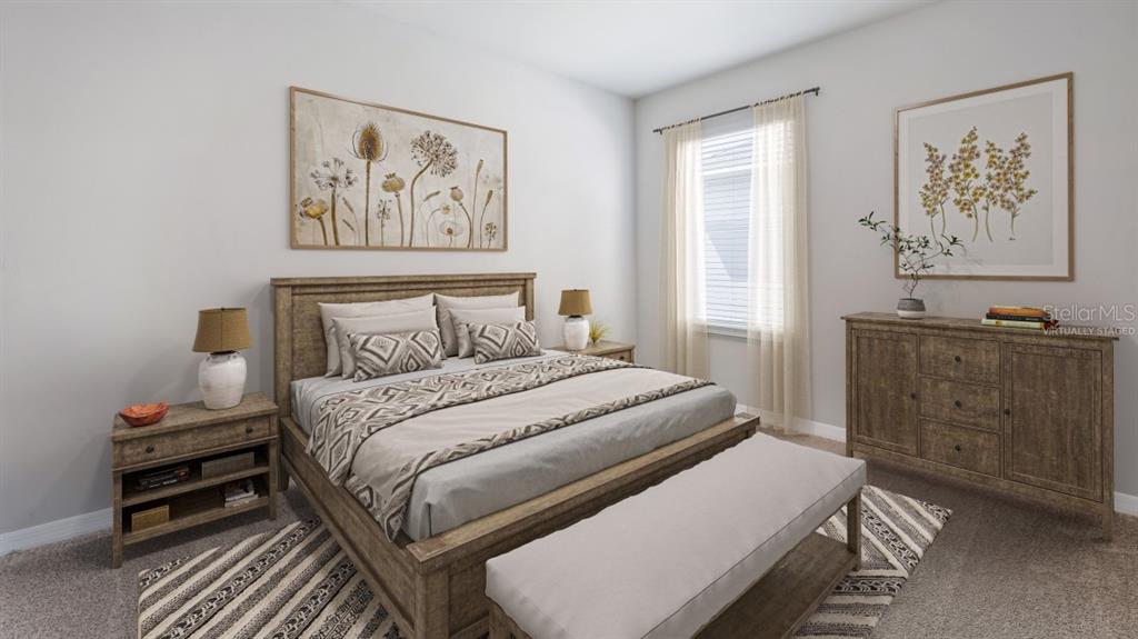 9450 Turtle Grass Circle Punta Gorda, FL 33950 - Photo 8 of 35 a bedroom with a bed and a window