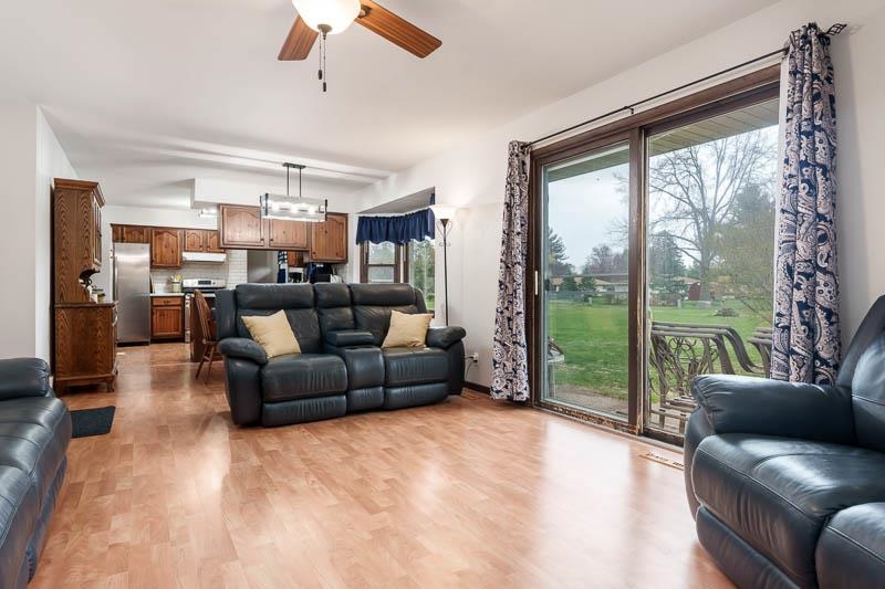 3824 Valerie Road Roscoe, IL 61073 - Photo 15 of 33 a living room with furniture and a large window