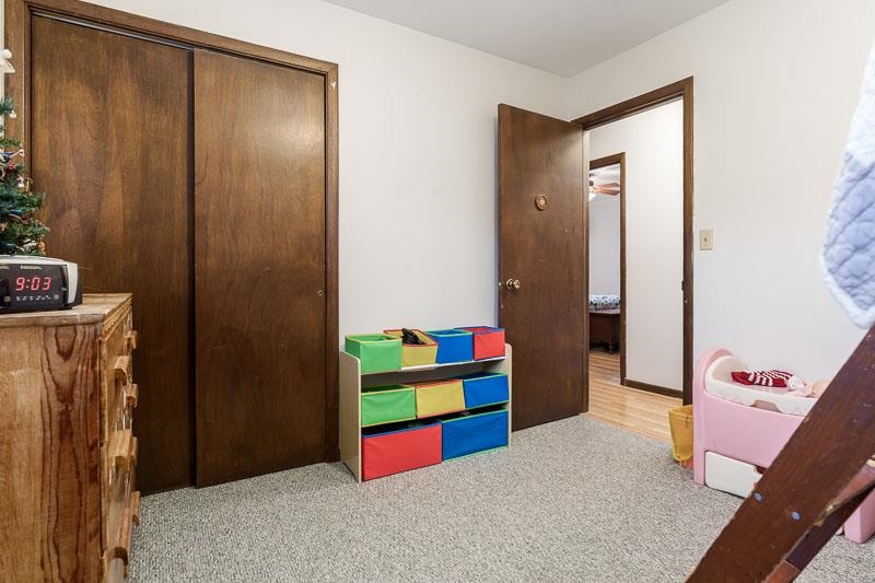 3824 Valerie Road Roscoe, IL 61073 - Photo 19 of 33 a bedroom with a bed and a dresser