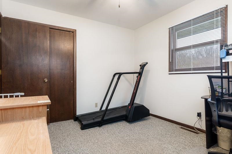 3824 Valerie Road Roscoe, IL 61073 - Photo 21 of 33 a view of a room with gym equipment