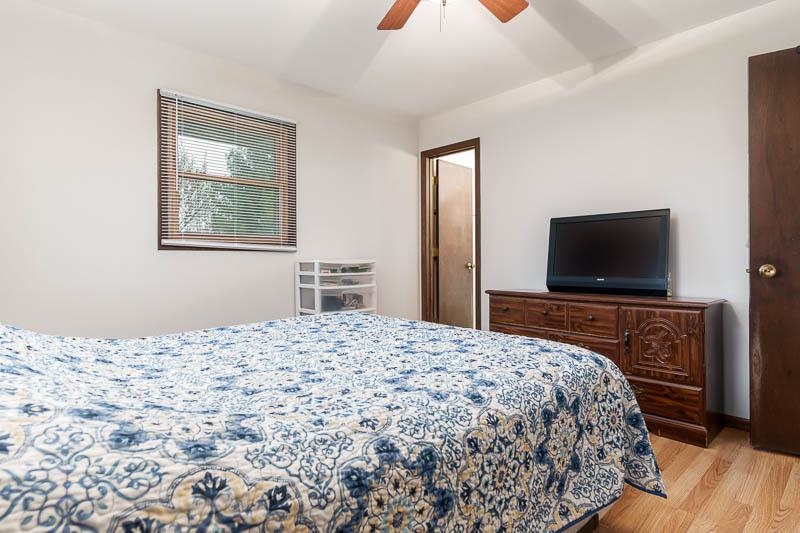 3824 Valerie Road Roscoe, IL 61073 - Photo 23 of 33 a bedroom with a bed and a flat screen tv