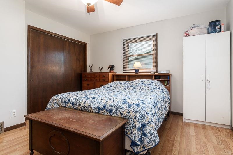 3824 Valerie Road Roscoe, IL 61073 - Photo 24 of 33 a bedroom with a bed and a dresser