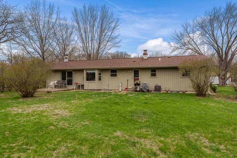 3824 Valerie Road Roscoe, IL 61073 - Photo 26 of 33 a view of a house with a backyard