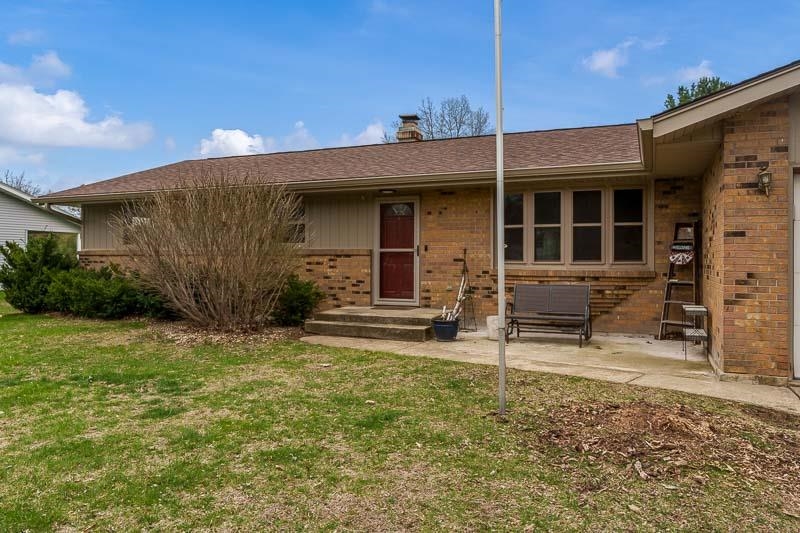 3824 Valerie Road Roscoe, IL 61073 - Photo 32 of 33 a view of a house with backyard and chairs