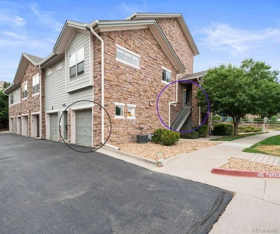 a view of a house with a street