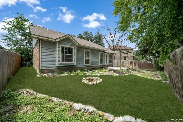 a house with garden in front of it