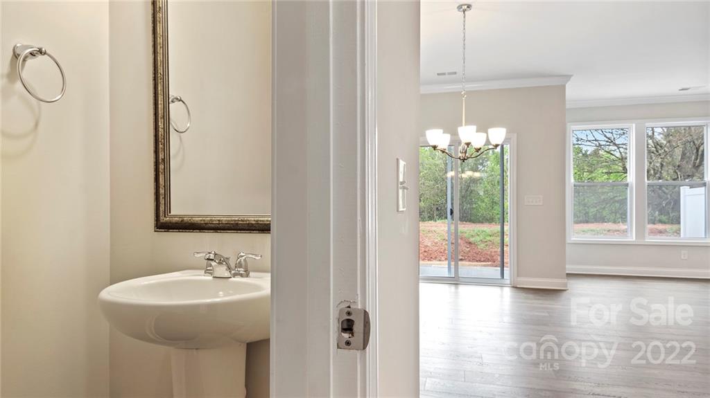 67 Creekview Road Hendersonville, NC 28792 - Photo 16 of 25 a bathroom with a sink and a mirror