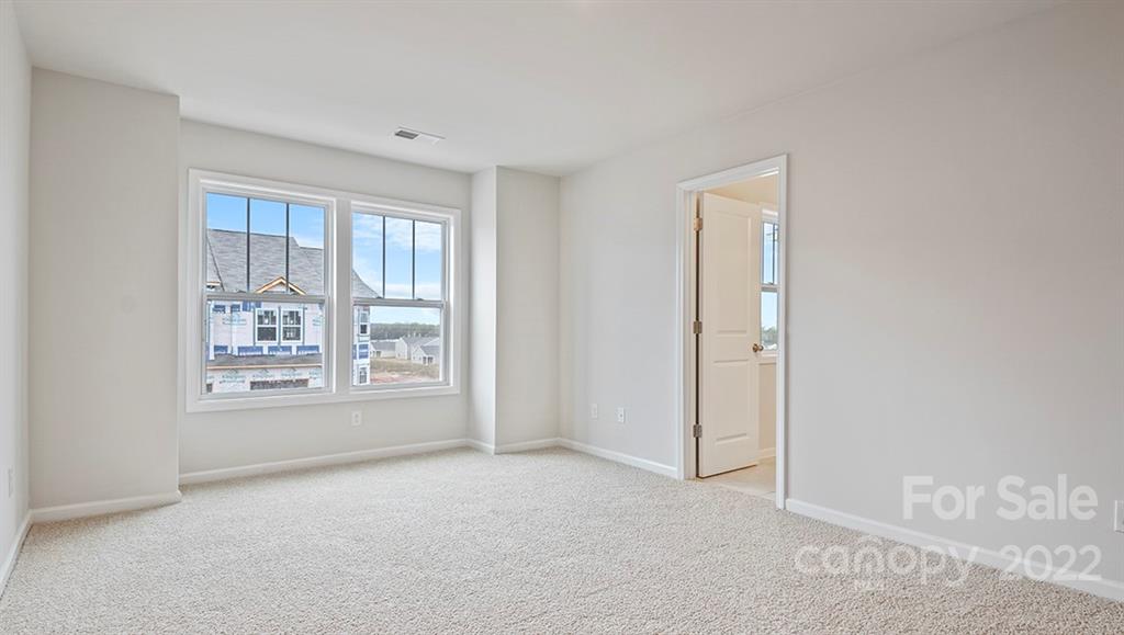 67 Creekview Road Hendersonville, NC 28792 - Photo 23 of 25 a view of an empty room with a window