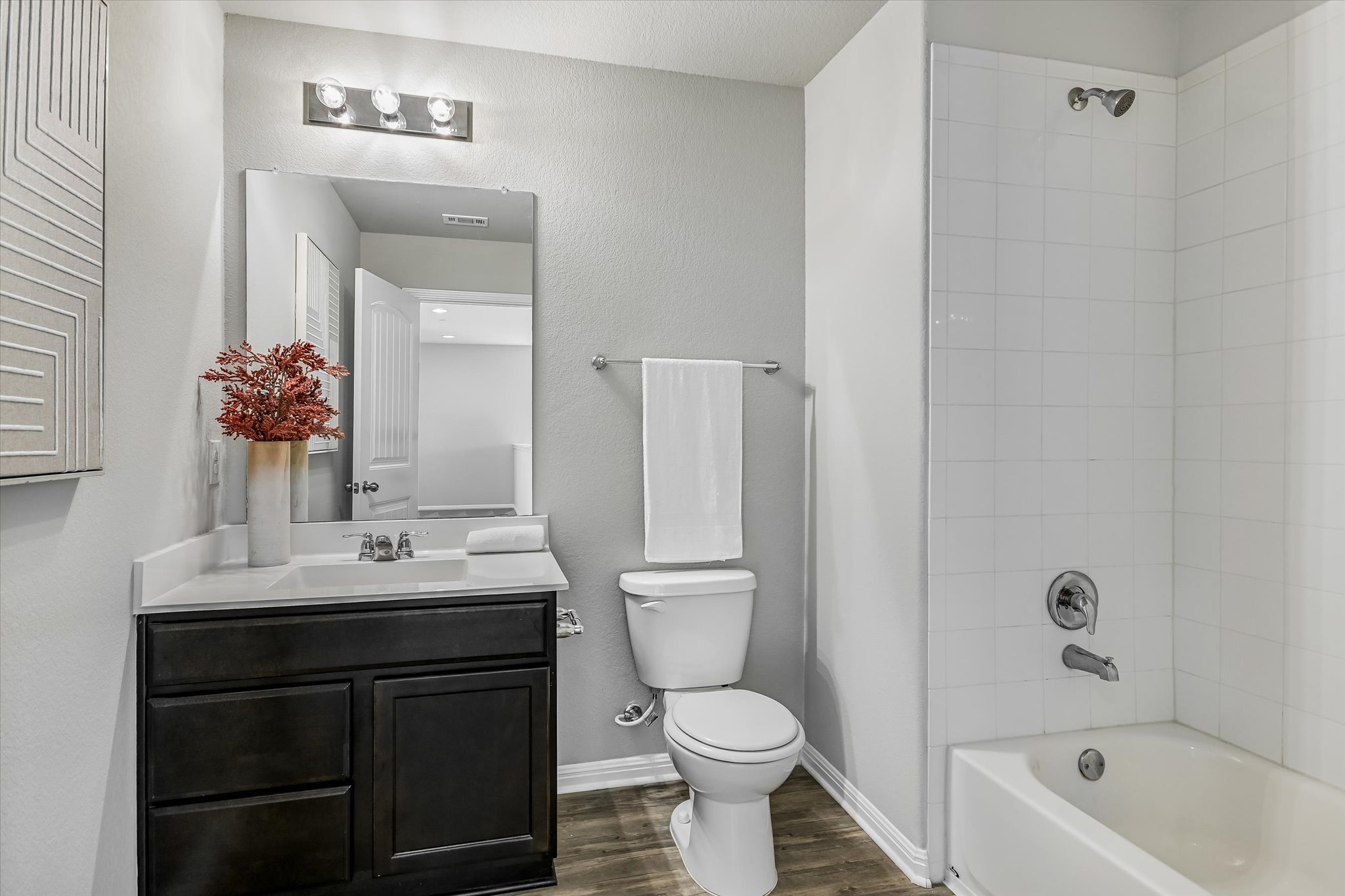 516 East Slaughter Lane, Unit 604 Austin, TX 78744 - Photo 21 of 35 a bathroom with a sink a toilet and shower