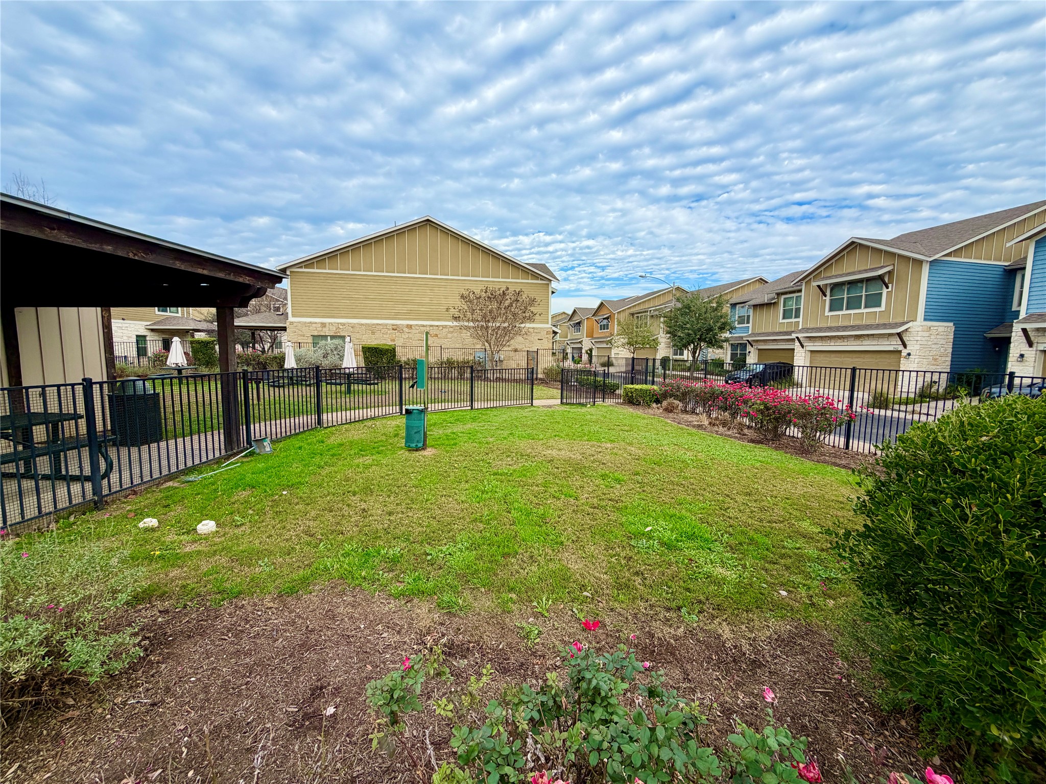 516 East Slaughter Lane, Unit 604 Austin, TX 78744 - Photo 33 of 35 a view of a house with a yard porch and sitting area