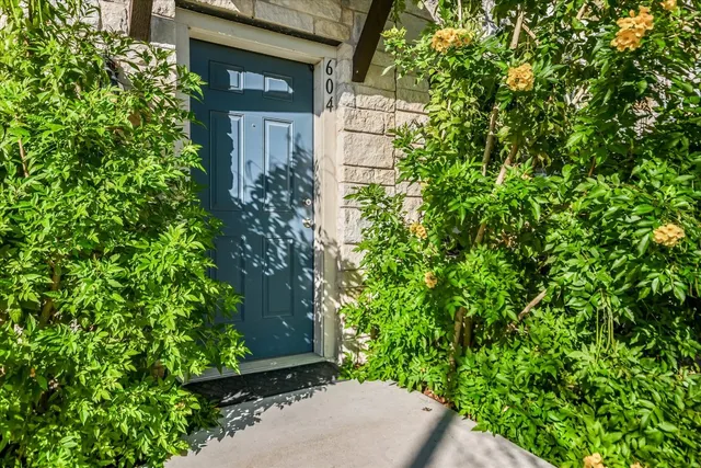 view of a house with a tree