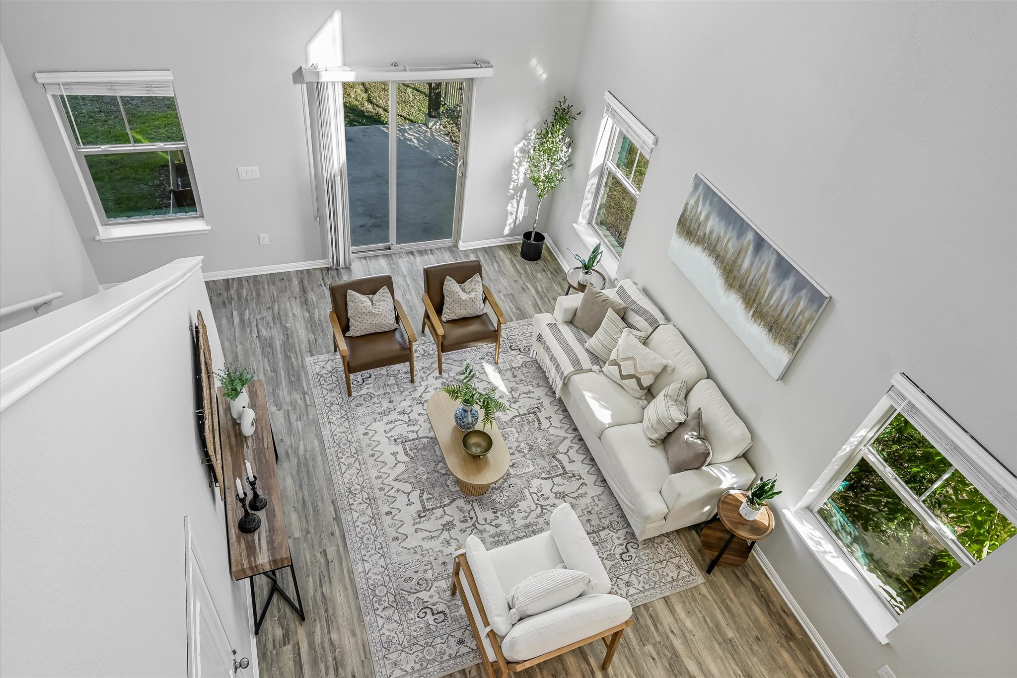 516 East Slaughter Lane, Unit 604 Austin, TX 78744 - Photo 8 of 35 a living room with furniture and wooden floor
