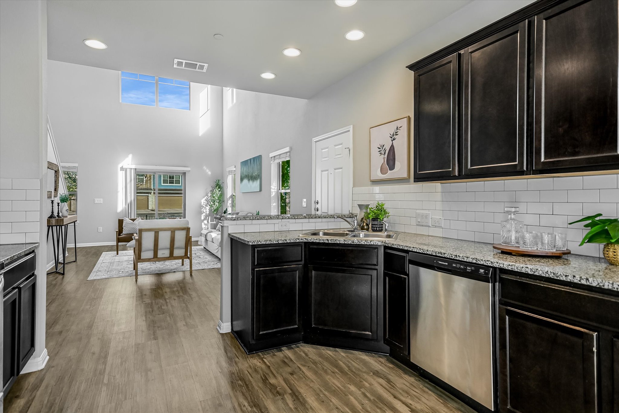 516 East Slaughter Lane, Unit 604 Austin, TX 78744 - Photo 10 of 35 a kitchen with stainless steel appliances granite countertop a stove and a sink