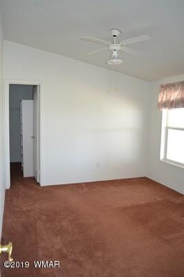 735 2300 North Snowflake, AZ 85937 - Photo 16 of 59 an empty room with windows and closet