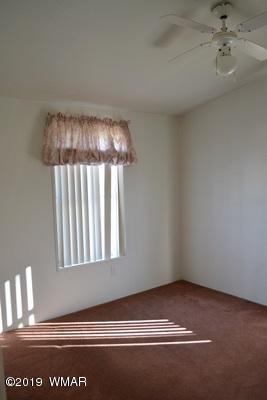 735 2300 North Snowflake, AZ 85937 - Photo 20 of 59 a view of room with a ceiling fan and window