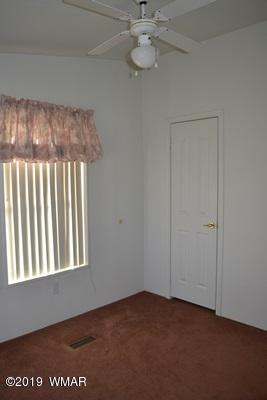735 2300 North Snowflake, AZ 85937 - Photo 21 of 59 an empty room with a window