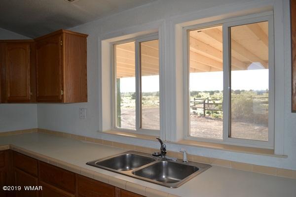 735 2300 North Snowflake, AZ 85937 - Photo 25 of 59 a kitchen with a sink and large window