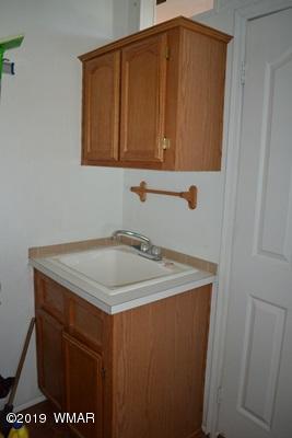 735 2300 North Snowflake, AZ 85937 - Photo 27 of 59 a bathroom with a sink and a mirror