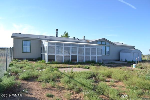 735 2300 North Snowflake, AZ 85937 - Photo 28 of 59 a view of a house with a yard and sitting area